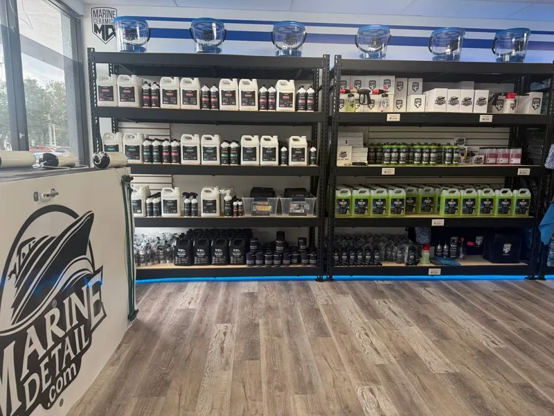 The showroom wall of Marine Detail products by the counter